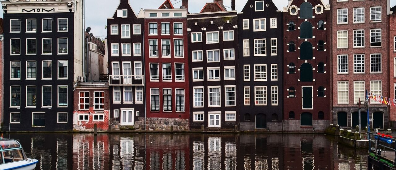 houses of Amsterdam, with the canal in the foreground