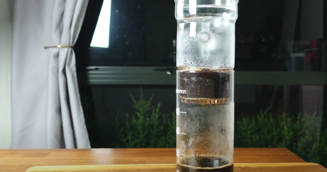 A container slowly dripping coffee